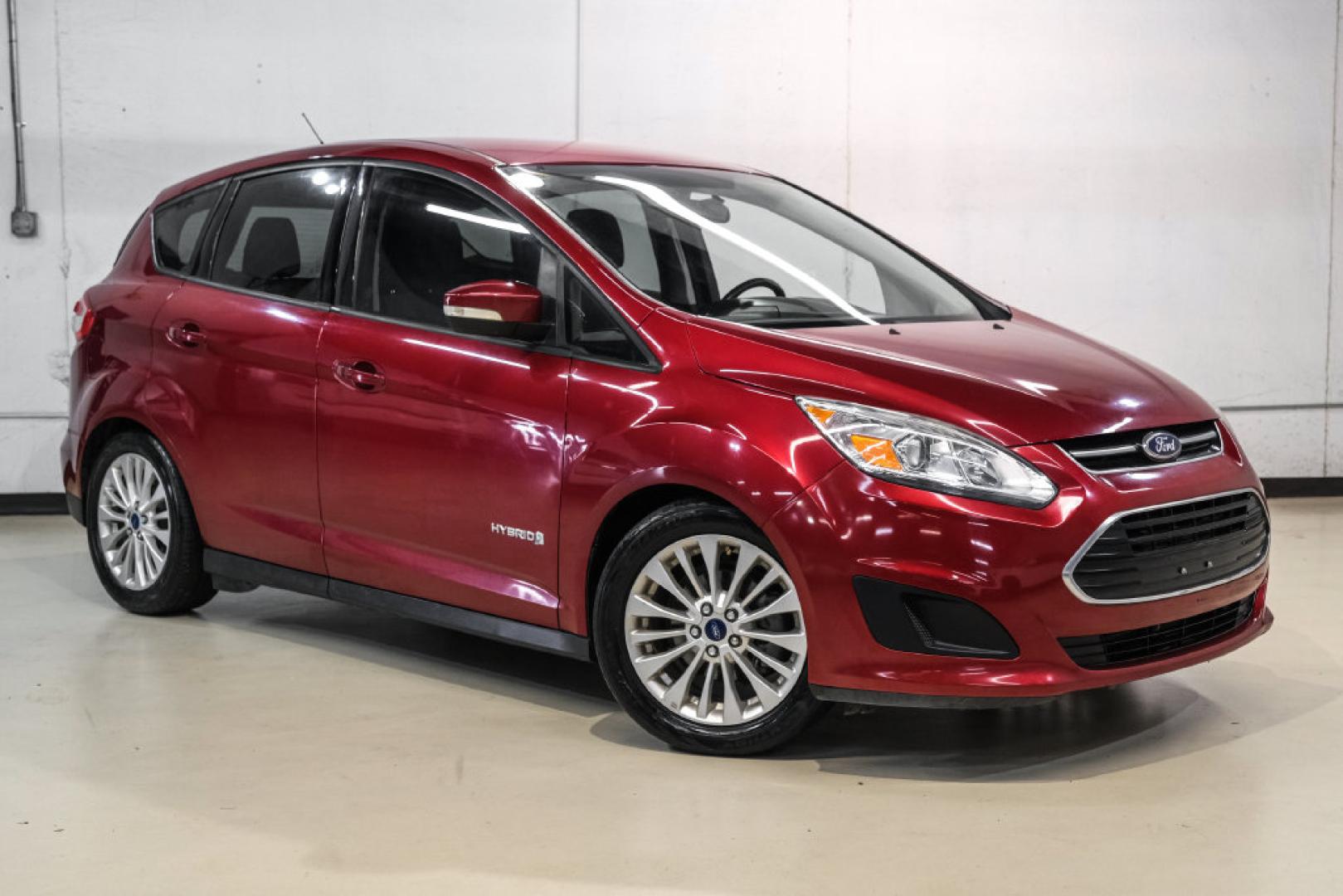 2017 Ruby Red Metallic /Black Ford C-Max Hybrid SE (1FADP5AU1HL) with an I4 Hybrid engine, CVT transmission, located at 15300 Midway Rd., Addison, TX, 75001, (972) 702-0011, 32.958321, -96.838074- Photo#5