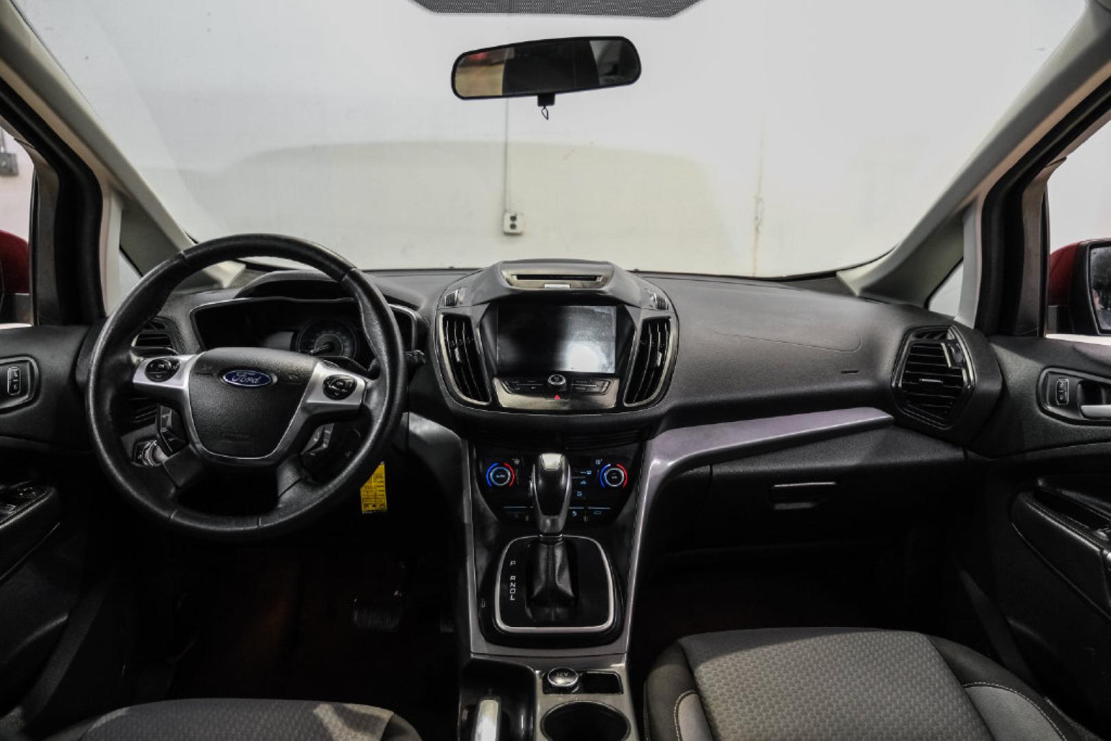 2017 Ruby Red Metallic /Black Ford C-Max Hybrid SE (1FADP5AU1HL) with an I4 Hybrid engine, CVT transmission, located at 15300 Midway Rd., Addison, TX, 75001, (972) 702-0011, 32.958321, -96.838074- Photo#12