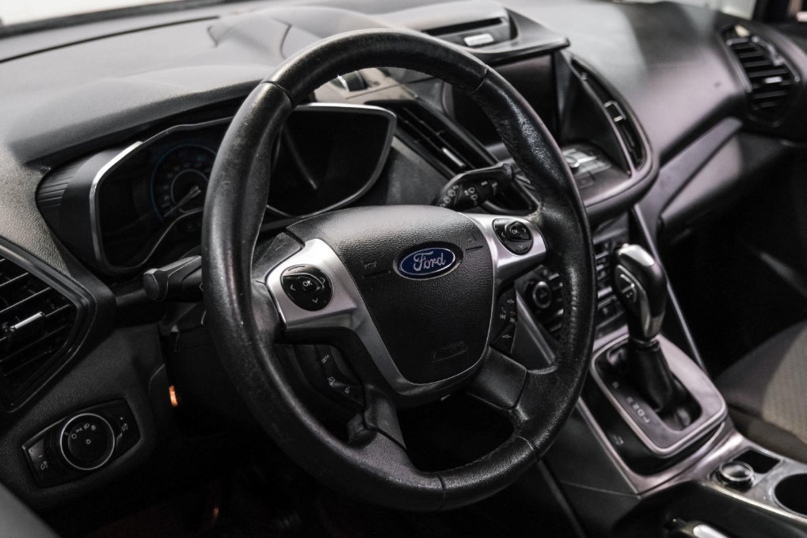 2017 Ruby Red Metallic /Black Ford C-Max Hybrid SE (1FADP5AU1HL) with an I4 Hybrid engine, CVT transmission, located at 15300 Midway Rd., Addison, TX, 75001, (972) 702-0011, 32.958321, -96.838074- Photo#14