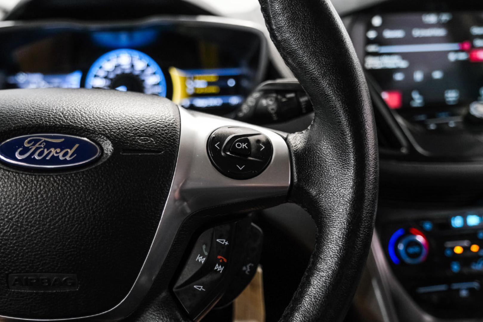 2017 Ruby Red Metallic /Black Ford C-Max Hybrid SE (1FADP5AU1HL) with an I4 Hybrid engine, CVT transmission, located at 15300 Midway Rd., Addison, TX, 75001, (972) 702-0011, 32.958321, -96.838074- Photo#16
