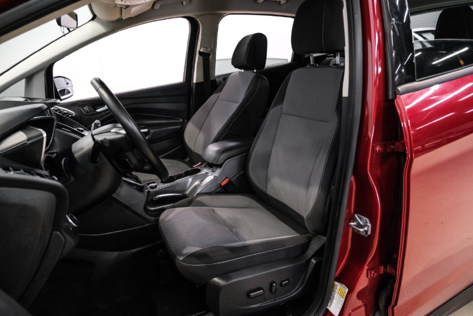 2017 Ruby Red Metallic /Black Ford C-Max Hybrid SE (1FADP5AU1HL) with an I4 Hybrid engine, CVT transmission, located at 15300 Midway Rd., Addison, TX, 75001, (972) 702-0011, 32.958321, -96.838074- Photo#27