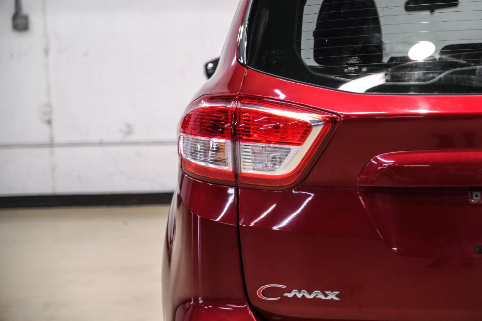 2017 Ruby Red Metallic /Black Ford C-Max Hybrid SE (1FADP5AU1HL) with an I4 Hybrid engine, CVT transmission, located at 15300 Midway Rd., Addison, TX, 75001, (972) 702-0011, 32.958321, -96.838074- Photo#42