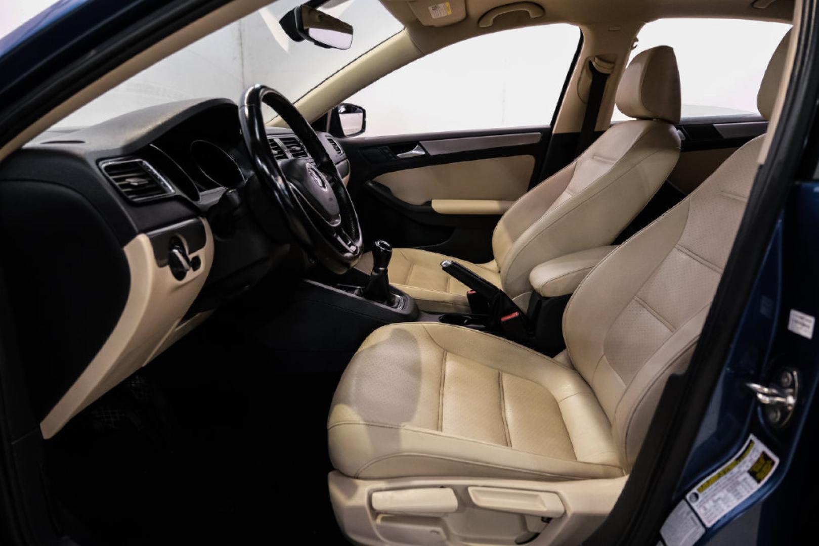 2017 Blue Metallic /Cornsilk Beige Volkswagen Jetta 1.4T SE (3VWB67AJ6HM) with an 1.4L TSI engine, Manual transmission, located at 15300 Midway Rd., Addison, TX, 75001, (972) 702-0011, 32.958321, -96.838074- Photo#3