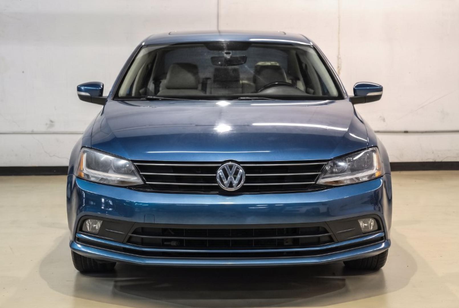 2017 Blue Metallic /Cornsilk Beige Volkswagen Jetta 1.4T SE (3VWB67AJ6HM) with an 1.4L TSI engine, Manual transmission, located at 15300 Midway Rd., Addison, TX, 75001, (972) 702-0011, 32.958321, -96.838074- Photo#4