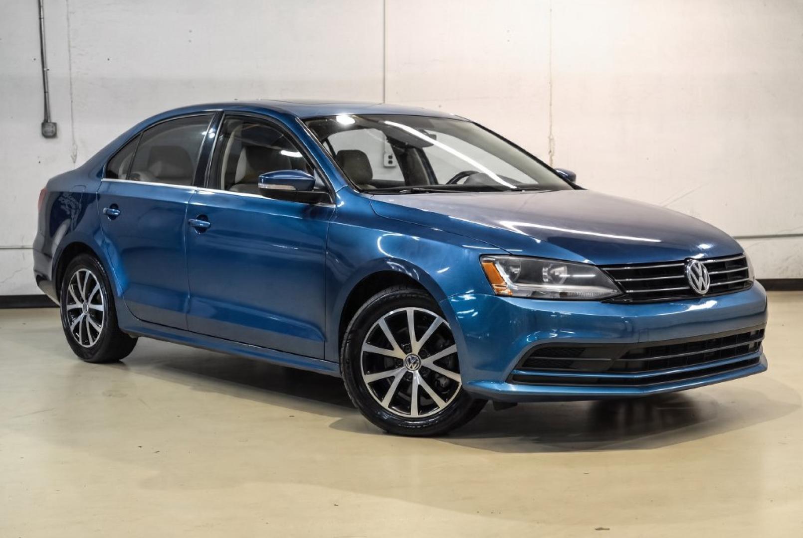 2017 Blue Metallic /Cornsilk Beige Volkswagen Jetta 1.4T SE (3VWB67AJ6HM) with an 1.4L TSI engine, Manual transmission, located at 15300 Midway Rd., Addison, TX, 75001, (972) 702-0011, 32.958321, -96.838074- Photo#5