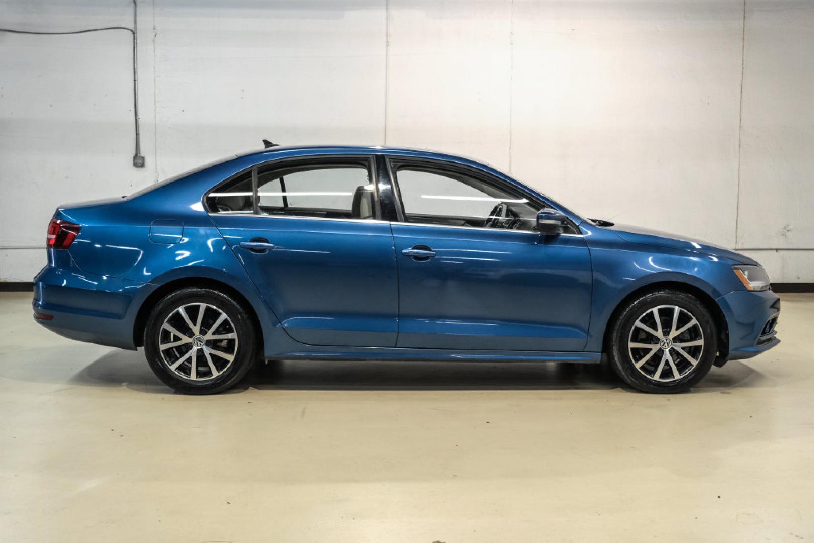 2017 Blue Metallic /Cornsilk Beige Volkswagen Jetta 1.4T SE (3VWB67AJ6HM) with an 1.4L TSI engine, Manual transmission, located at 15300 Midway Rd., Addison, TX, 75001, (972) 702-0011, 32.958321, -96.838074- Photo#6