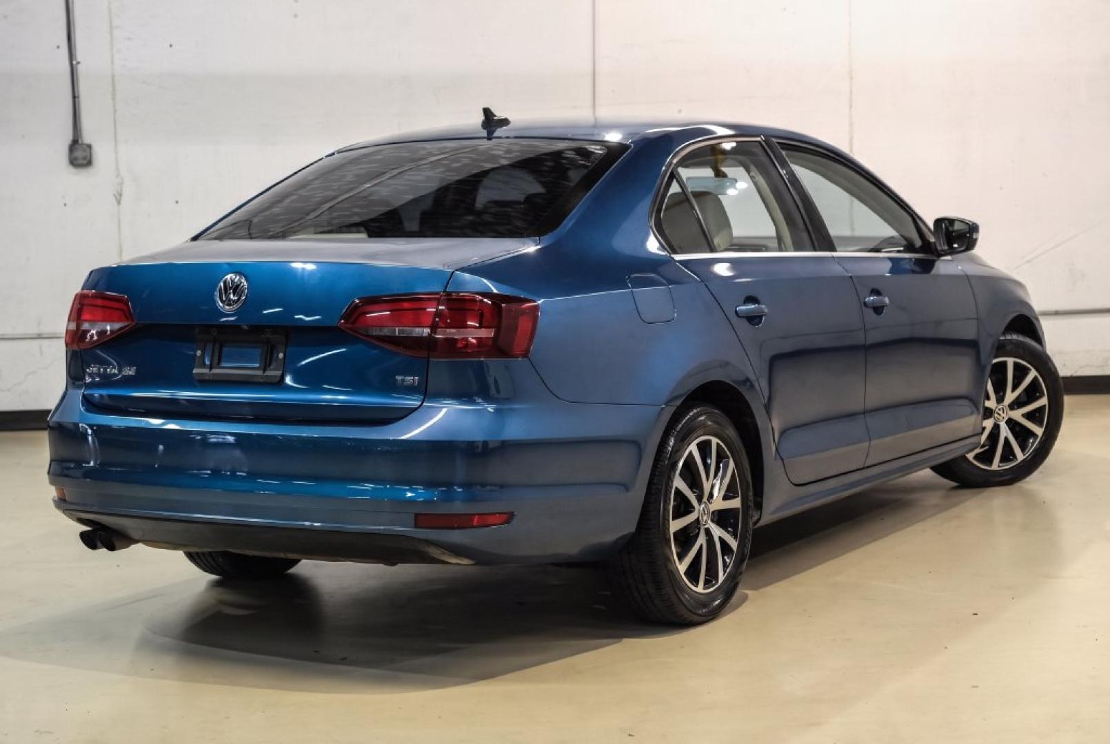 2017 Blue Metallic /Cornsilk Beige Volkswagen Jetta 1.4T SE (3VWB67AJ6HM) with an 1.4L TSI engine, Manual transmission, located at 15300 Midway Rd., Addison, TX, 75001, (972) 702-0011, 32.958321, -96.838074- Photo#7