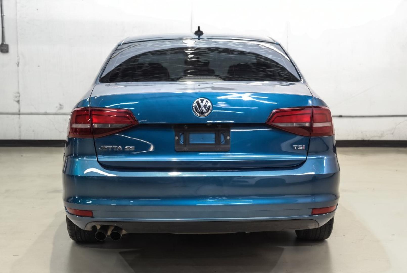 2017 Blue Metallic /Cornsilk Beige Volkswagen Jetta 1.4T SE (3VWB67AJ6HM) with an 1.4L TSI engine, Manual transmission, located at 15300 Midway Rd., Addison, TX, 75001, (972) 702-0011, 32.958321, -96.838074- Photo#8
