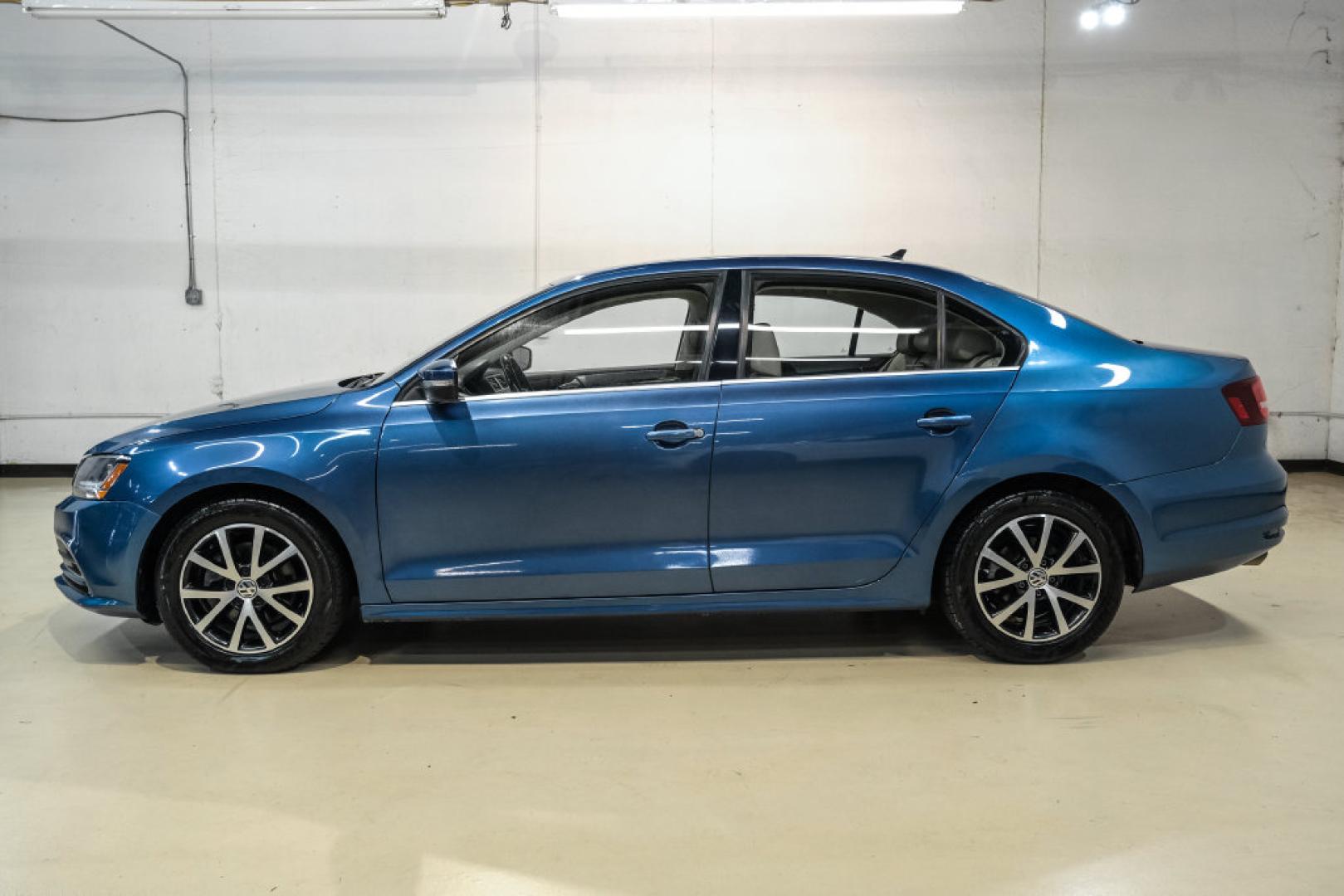 2017 Blue Metallic /Cornsilk Beige Volkswagen Jetta 1.4T SE (3VWB67AJ6HM) with an 1.4L TSI engine, Manual transmission, located at 15300 Midway Rd., Addison, TX, 75001, (972) 702-0011, 32.958321, -96.838074- Photo#10