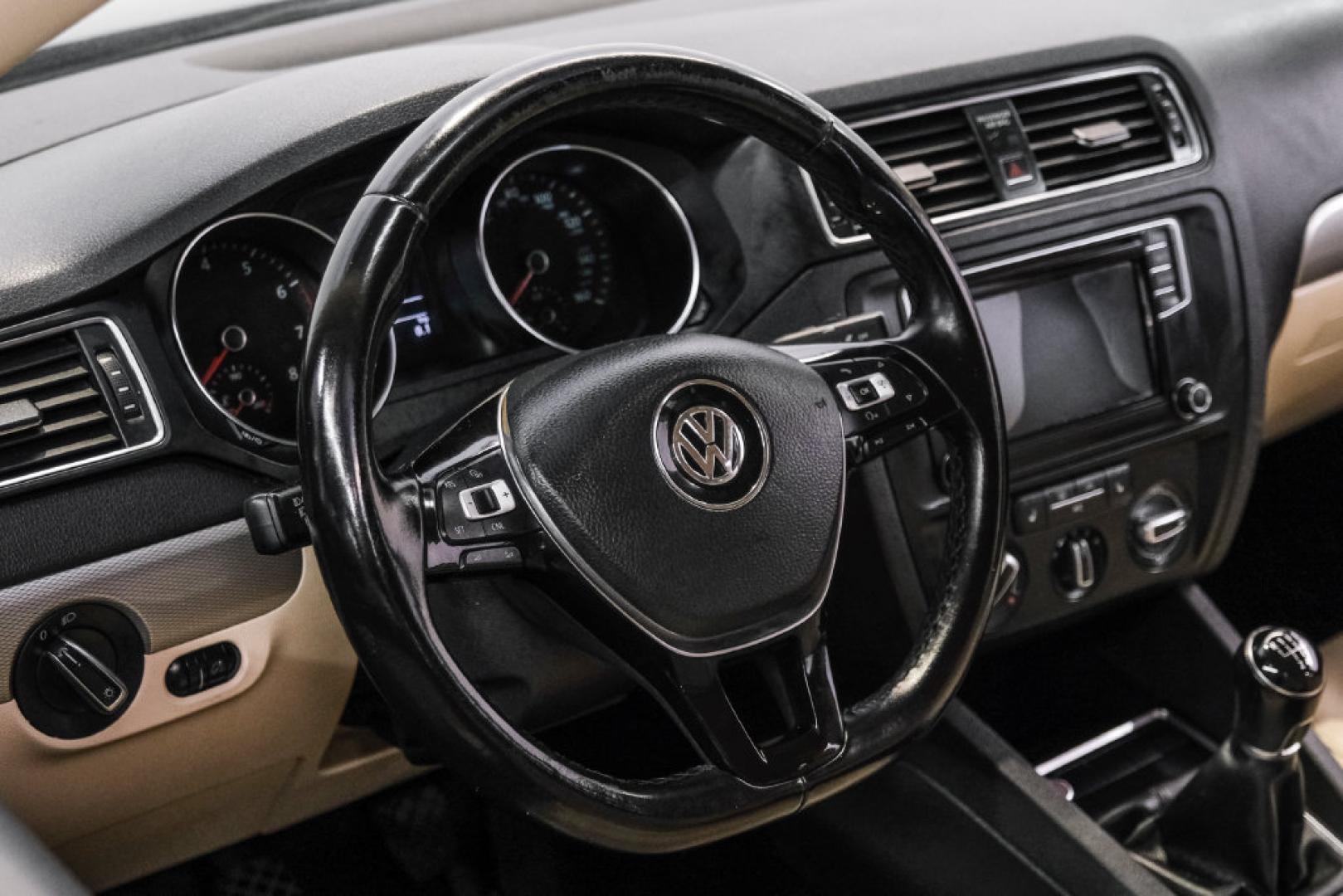 2017 Blue Metallic /Cornsilk Beige Volkswagen Jetta 1.4T SE (3VWB67AJ6HM) with an 1.4L TSI engine, Manual transmission, located at 15300 Midway Rd., Addison, TX, 75001, (972) 702-0011, 32.958321, -96.838074- Photo#14