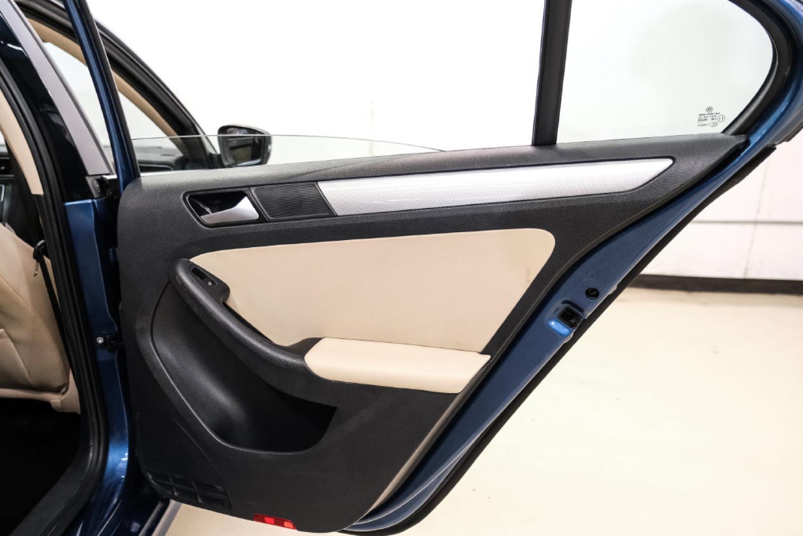 2017 Blue Metallic /Cornsilk Beige Volkswagen Jetta 1.4T SE (3VWB67AJ6HM) with an 1.4L TSI engine, Manual transmission, located at 15300 Midway Rd., Addison, TX, 75001, (972) 702-0011, 32.958321, -96.838074- Photo#45