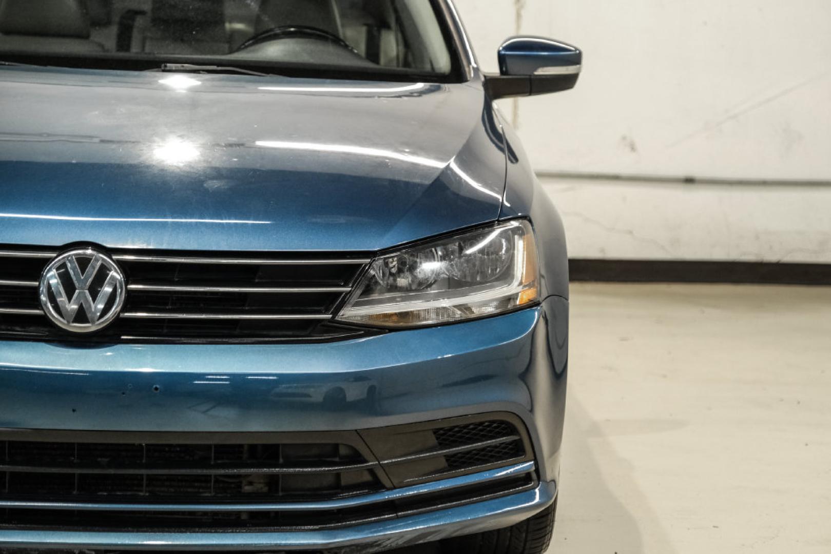 2017 Blue Metallic /Cornsilk Beige Volkswagen Jetta 1.4T SE (3VWB67AJ6HM) with an 1.4L TSI engine, Manual transmission, located at 15300 Midway Rd., Addison, TX, 75001, (972) 702-0011, 32.958321, -96.838074- Photo#46
