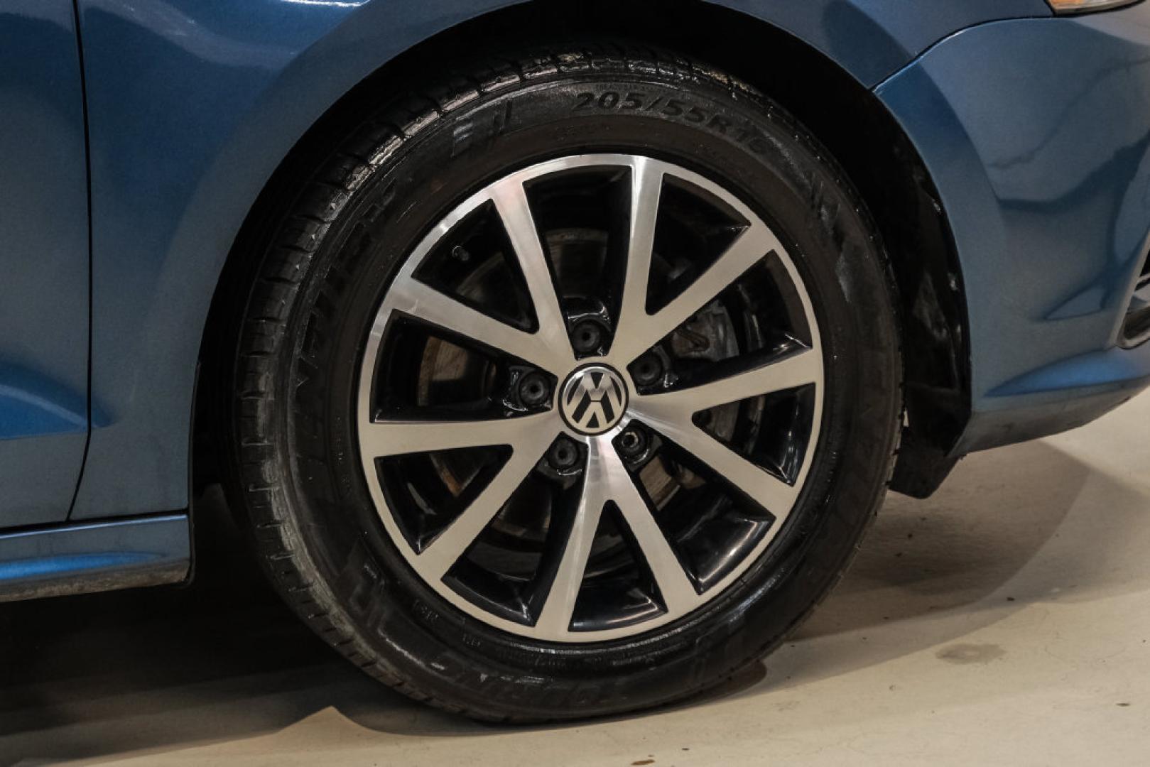 2017 Blue Metallic /Cornsilk Beige Volkswagen Jetta 1.4T SE (3VWB67AJ6HM) with an 1.4L TSI engine, Manual transmission, located at 15300 Midway Rd., Addison, TX, 75001, (972) 702-0011, 32.958321, -96.838074- Photo#58
