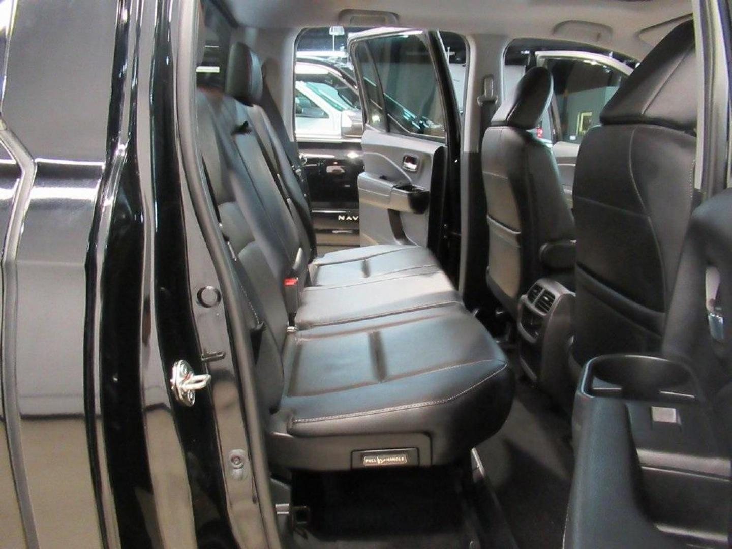 2019 Crystal Black Pearl /Black Honda Ridgeline RTL-E (5FPYK3F75KB) with an 3.5L V6 SOHC i-VTEC 24V engine, Automatic transmission, located at 15300 Midway Rd., Addison, TX, 75001, (972) 702-0011, 32.958321, -96.838074 - HOME OF THE NO HAGGLE PRICE - WHOLESALE PRICES TO THE PUBLIC!! 4WD, Bluetooth, Hands Free Connectivity, Navigation, Premium Audio, Backup Camera, Leather Seats, Sunroof / Moonroof, Ridgeline RTL-E, 4D Crew Cab, 3.5L V6 SOHC i-VTEC 24V, 6-Speed Automatic, AWD, Black, Black Leather.<br><br>Black 2019 - Photo#27