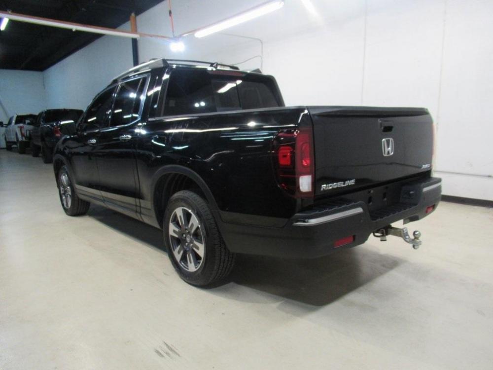 2019 Crystal Black Pearl /Black Honda Ridgeline RTL-E (5FPYK3F75KB) with an 3.5L V6 SOHC i-VTEC 24V engine, Automatic transmission, located at 15300 Midway Rd., Addison, 75001, (972) 702-0011, 32.958321, -96.838074 - HOME OF THE NO HAGGLE PRICE - WHOLESALE PRICES TO THE PUBLIC!! 4WD, Bluetooth, Hands Free Connectivity, Navigation, Premium Audio, Backup Camera, Leather Seats, Sunroof / Moonroof, Ridgeline RTL-E, 4D Crew Cab, 3.5L V6 SOHC i-VTEC 24V, 6-Speed Automatic, AWD, Black, Black Leather.<br><br>Black 2019 - Photo #3