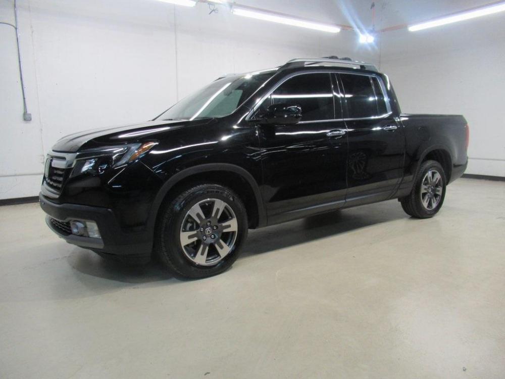 2019 Crystal Black Pearl /Black Honda Ridgeline RTL-E (5FPYK3F75KB) with an 3.5L V6 SOHC i-VTEC 24V engine, Automatic transmission, located at 15300 Midway Rd., Addison, 75001, (972) 702-0011, 32.958321, -96.838074 - HOME OF THE NO HAGGLE PRICE - WHOLESALE PRICES TO THE PUBLIC!! 4WD, Bluetooth, Hands Free Connectivity, Navigation, Premium Audio, Backup Camera, Leather Seats, Sunroof / Moonroof, Ridgeline RTL-E, 4D Crew Cab, 3.5L V6 SOHC i-VTEC 24V, 6-Speed Automatic, AWD, Black, Black Leather.<br><br>Black 2019 - Photo #4