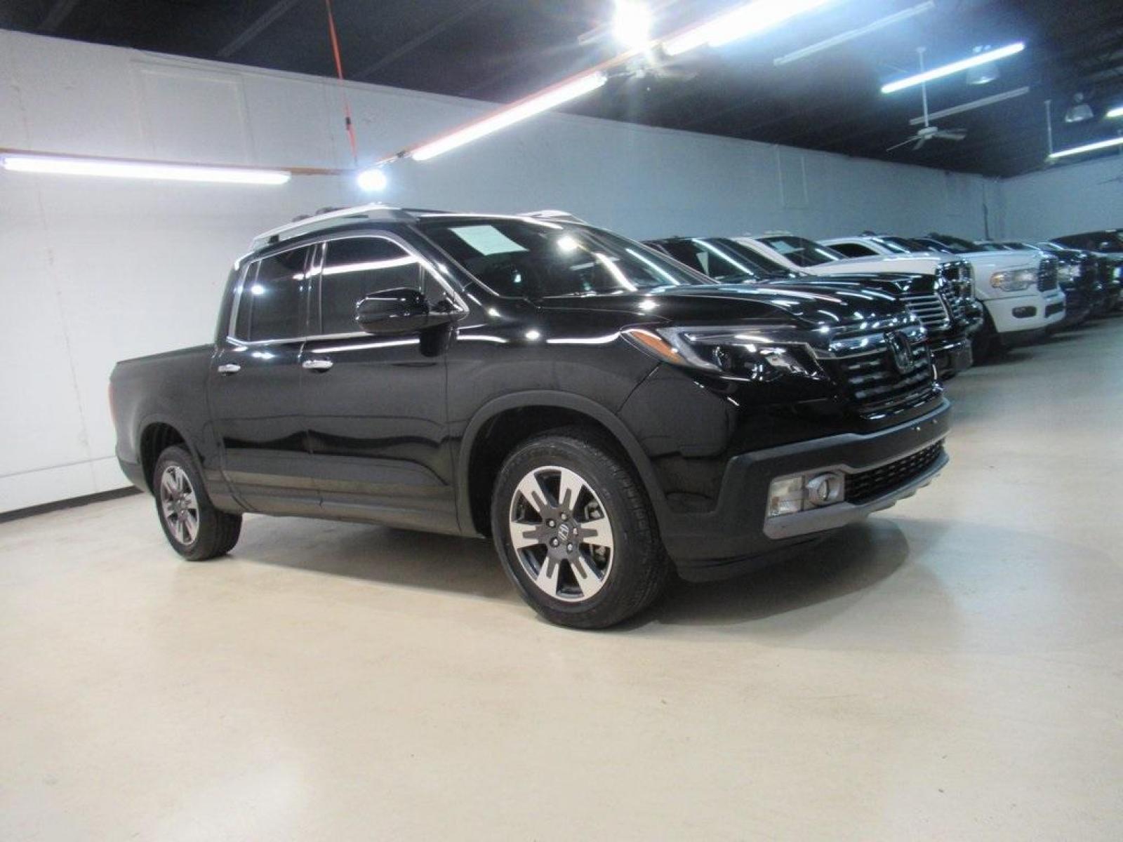 2019 Crystal Black Pearl /Black Honda Ridgeline RTL-E (5FPYK3F75KB) with an 3.5L V6 SOHC i-VTEC 24V engine, Automatic transmission, located at 15300 Midway Rd., Addison, 75001, (972) 702-0011, 32.958321, -96.838074 - HOME OF THE NO HAGGLE PRICE - WHOLESALE PRICES TO THE PUBLIC!! 4WD, Bluetooth, Hands Free Connectivity, Navigation, Premium Audio, Backup Camera, Leather Seats, Sunroof / Moonroof, Ridgeline RTL-E, 4D Crew Cab, 3.5L V6 SOHC i-VTEC 24V, 6-Speed Automatic, AWD, Black, Black Leather.<br><br>Black 2019 - Photo #6