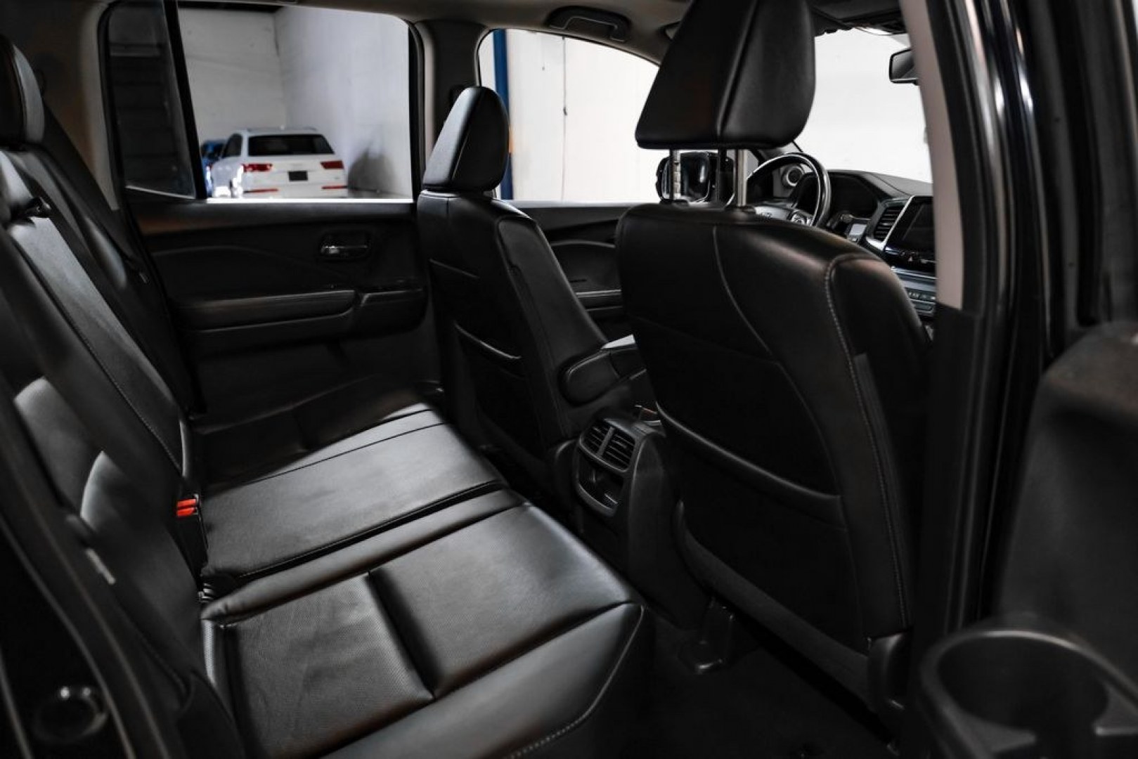 2019 Crystal Black Pearl /Black Honda Ridgeline RTL-E (5FPYK3F75KB) with an 3.5L V6 SOHC i-VTEC 24V engine, Automatic transmission, located at 15300 Midway Rd., Addison, TX, 75001, (972) 702-0011, 32.958321, -96.838074 - Photo#39