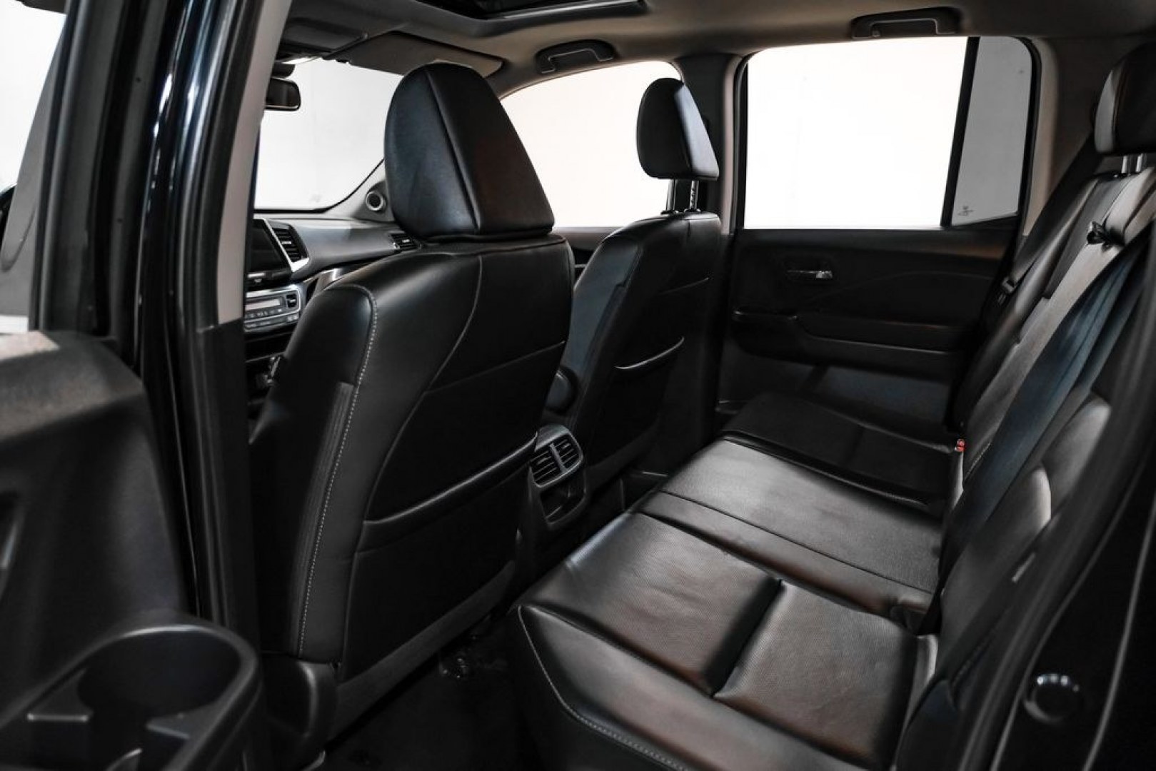 2019 Crystal Black Pearl /Black Honda Ridgeline RTL-E (5FPYK3F75KB) with an 3.5L V6 SOHC i-VTEC 24V engine, Automatic transmission, located at 15300 Midway Rd., Addison, TX, 75001, (972) 702-0011, 32.958321, -96.838074 - Photo#40