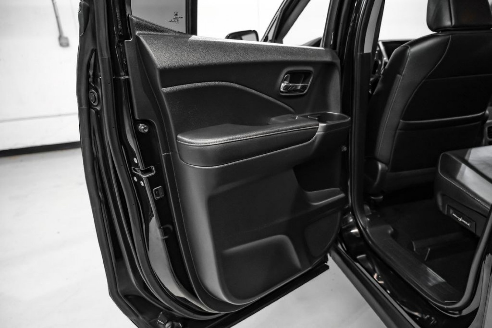 2019 Crystal Black Pearl /Black Honda Ridgeline RTL-E (5FPYK3F75KB) with an 3.5L V6 SOHC i-VTEC 24V engine, Automatic transmission, located at 15300 Midway Rd., Addison, TX, 75001, (972) 702-0011, 32.958321, -96.838074 - Photo#48