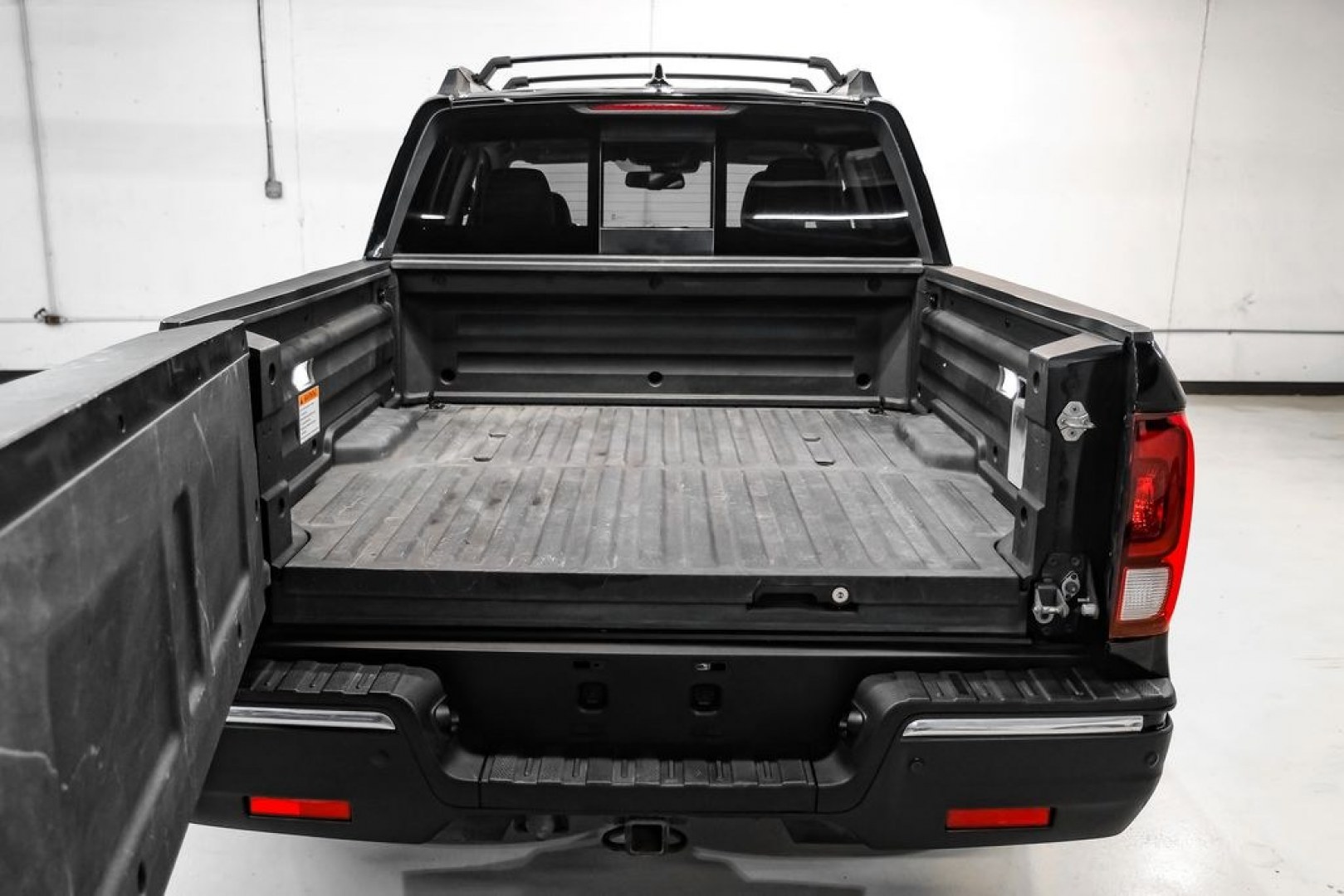 2019 Crystal Black Pearl /Black Honda Ridgeline RTL-E (5FPYK3F75KB) with an 3.5L V6 SOHC i-VTEC 24V engine, Automatic transmission, located at 15300 Midway Rd., Addison, TX, 75001, (972) 702-0011, 32.958321, -96.838074 - Photo#57