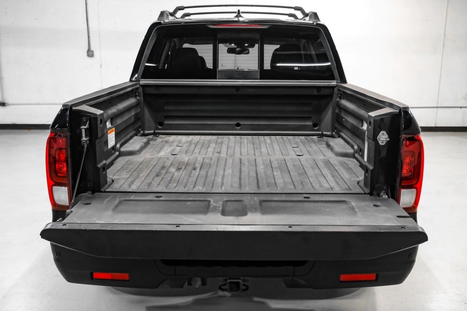 2019 Crystal Black Pearl /Black Honda Ridgeline RTL-E (5FPYK3F75KB) with an 3.5L V6 SOHC i-VTEC 24V engine, Automatic transmission, located at 15300 Midway Rd., Addison, TX, 75001, (972) 702-0011, 32.958321, -96.838074 - Photo#58