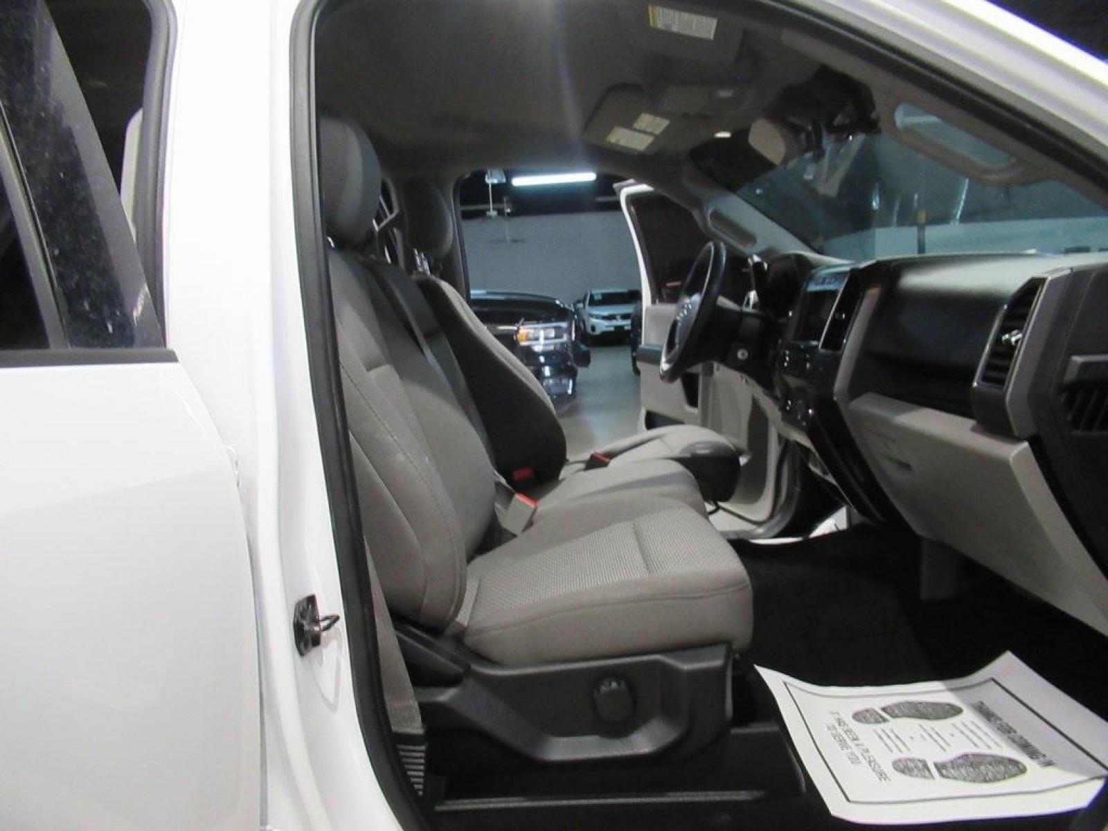 2019 Oxford White /Dark Earth Gray Ford F-150 XLT (1FTEW1E49KF) with an 3.5L V6 EcoBoost engine, Automatic transmission, located at 15300 Midway Rd., Addison, TX, 75001, (972) 702-0011, 32.958321, -96.838074 - HOME OF THE NO HAGGLE PRICE - WHOLESALE PRICES TO THE PUBLIC!! 4WD, Backup Camera, F-150 XLT, 4D SuperCrew, 3.5L V6 EcoBoost, 10-Speed Automatic, 4WD, Oxford White, Dark Earth Gray w/Cloth 40/20/40 Front Seat. Priced below KBB Fair Purchase Price!<br><br>Oxford White 2019 Ford F-150 XLT<br><br><br>A - Photo #14