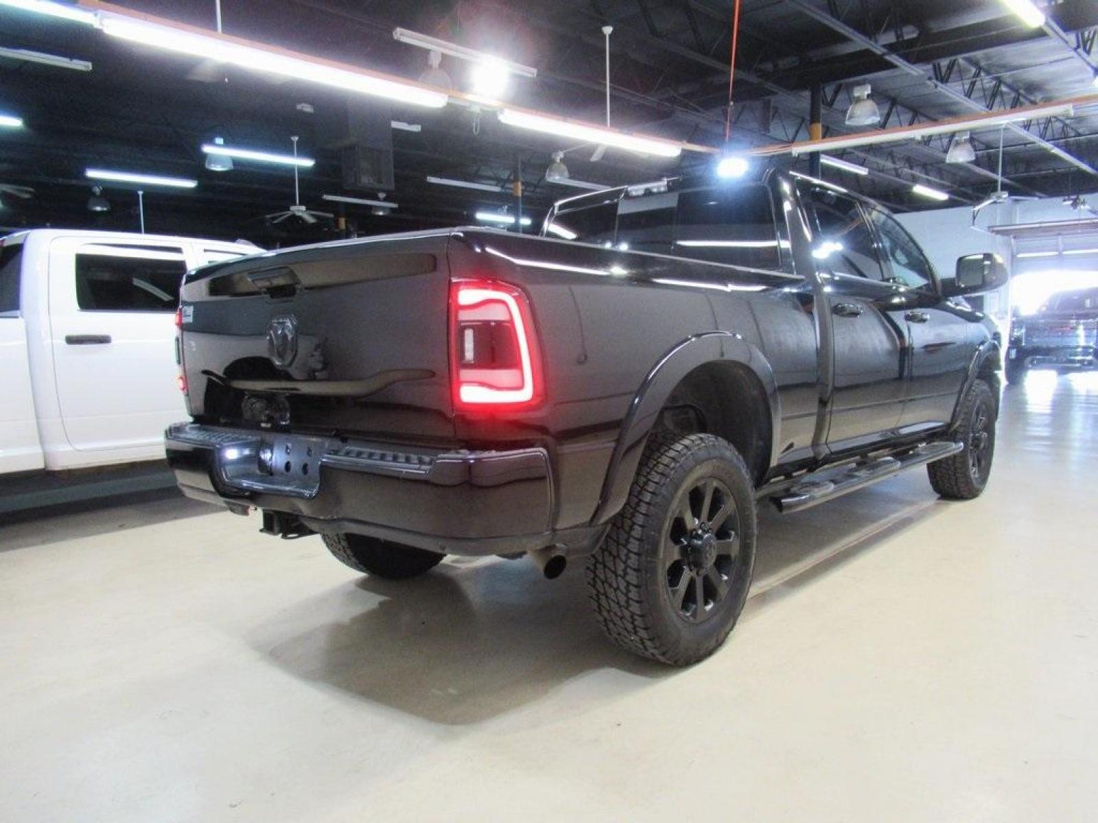 2019 Diamond Black Crystal Pearlcoat /Black Ram 2500 Laramie (3C6UR5FJ2KG) with an 6.4L Heavy Duty V8 HEMI w/MDS engine, Automatic transmission, located at 15300 Midway Rd., Addison, 75001, (972) 702-0011, 32.958321, -96.838074 - HOME OF THE NO HAGGLE PRICE - WHOLESALE PRICES TO THE PUBLIC!! 4WD, Premium Audio, Backup Camera, Leather Seats, Premium Wheels, 2500 Laramie, 4D Crew Cab, 6.4L Heavy Duty V8 HEMI w/MDS, 8-Speed Automatic, 4WD, Diamond Black Crystal Pearlcoat, Black Leather.<br><br>Diamond Black Crystal Pearlcoat 20 - Photo #2