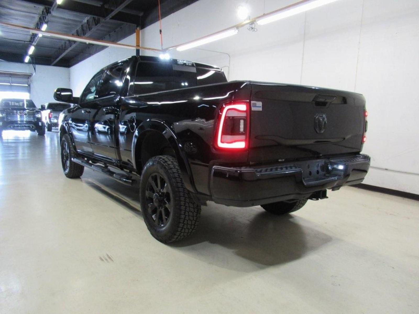 2019 Diamond Black Crystal Pearlcoat /Black Ram 2500 Laramie (3C6UR5FJ2KG) with an 6.4L Heavy Duty V8 HEMI w/MDS engine, Automatic transmission, located at 15300 Midway Rd., Addison, 75001, (972) 702-0011, 32.958321, -96.838074 - HOME OF THE NO HAGGLE PRICE - WHOLESALE PRICES TO THE PUBLIC!! 4WD, Premium Audio, Backup Camera, Leather Seats, Premium Wheels, 2500 Laramie, 4D Crew Cab, 6.4L Heavy Duty V8 HEMI w/MDS, 8-Speed Automatic, 4WD, Diamond Black Crystal Pearlcoat, Black Leather.<br><br>Diamond Black Crystal Pearlcoat 20 - Photo #3
