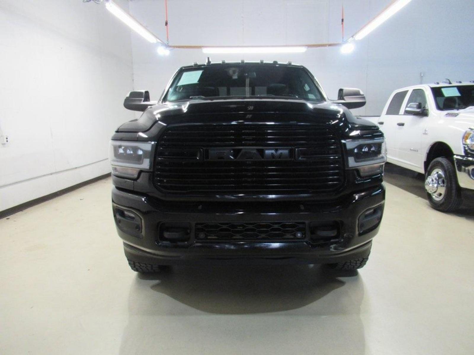 2019 Diamond Black Crystal Pearlcoat /Black Ram 2500 Laramie (3C6UR5FJ2KG) with an 6.4L Heavy Duty V8 HEMI w/MDS engine, Automatic transmission, located at 15300 Midway Rd., Addison, 75001, (972) 702-0011, 32.958321, -96.838074 - HOME OF THE NO HAGGLE PRICE - WHOLESALE PRICES TO THE PUBLIC!! 4WD, Premium Audio, Backup Camera, Leather Seats, Premium Wheels, 2500 Laramie, 4D Crew Cab, 6.4L Heavy Duty V8 HEMI w/MDS, 8-Speed Automatic, 4WD, Diamond Black Crystal Pearlcoat, Black Leather.<br><br>Diamond Black Crystal Pearlcoat 20 - Photo #5