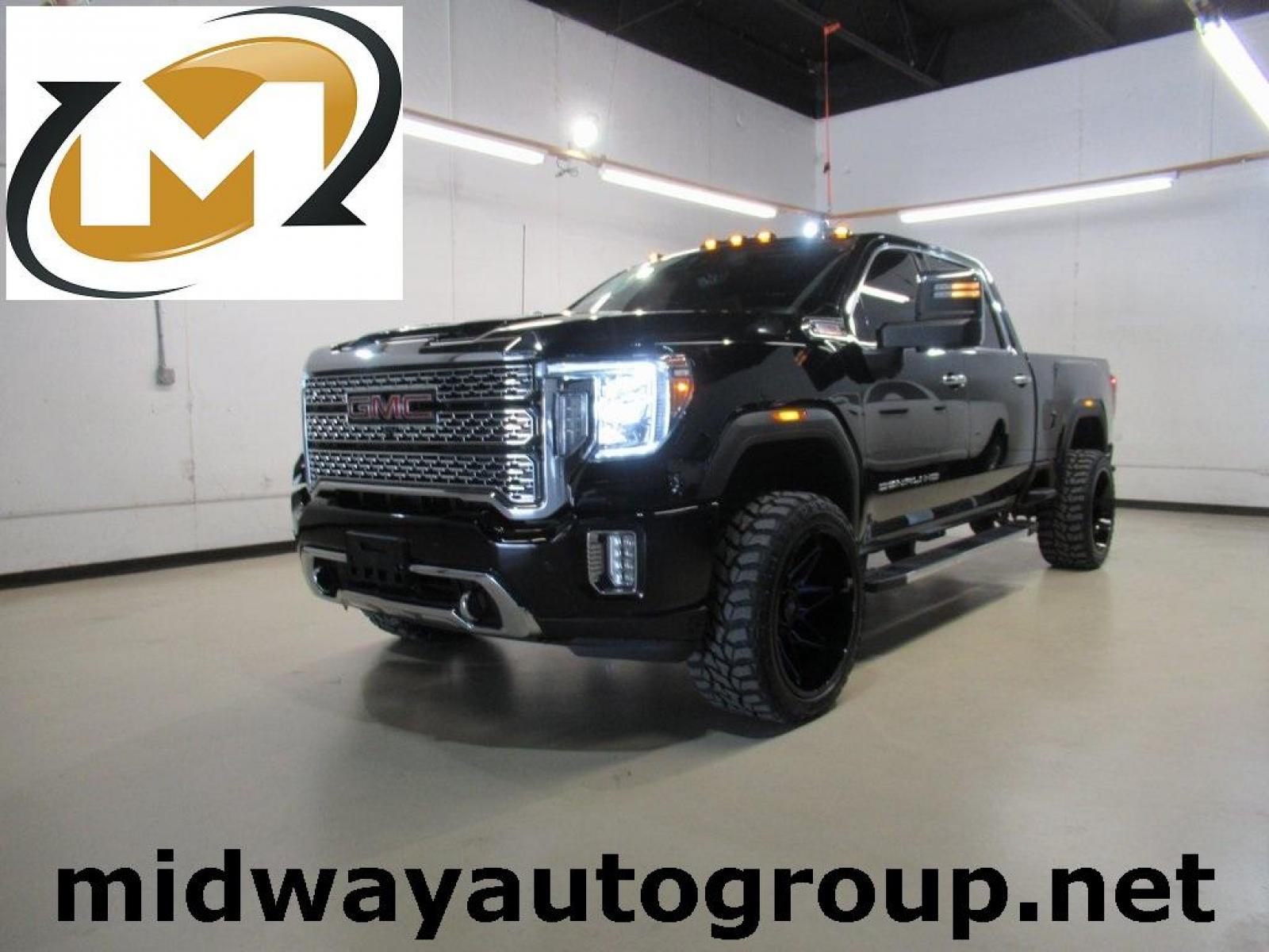 2020 Onyx Black /Jet Black GMC Sierra 2500HD Denali (1GT49REY1LF) with an Duramax 6.6L V8 Turbodiesel engine, Automatic transmission, located at 15300 Midway Rd., Addison, 75001, (972) 702-0011, 32.958321, -96.838074 - HOME OF THE NO HAGGLE PRICE - WHOLESALE PRICES TO THE PUBLIC!! 4WD, Bluetooth, Hands Free Connectivity, Navigation, Portable Audio Connections, Premium Audio, Backup Camera, Leather Seats, Premium Wheels, High Performance Tires, Sunroof / Moonroof, Sierra 2500HD Denali, 4D Crew Cab, Duramax 6.6L V8 - Photo #0