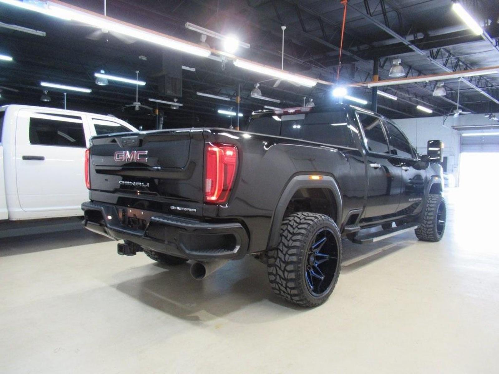 2020 Onyx Black /Jet Black GMC Sierra 2500HD Denali (1GT49REY1LF) with an Duramax 6.6L V8 Turbodiesel engine, Automatic transmission, located at 15300 Midway Rd., Addison, 75001, (972) 702-0011, 32.958321, -96.838074 - HOME OF THE NO HAGGLE PRICE - WHOLESALE PRICES TO THE PUBLIC!! 4WD, Bluetooth, Hands Free Connectivity, Navigation, Portable Audio Connections, Premium Audio, Backup Camera, Leather Seats, Premium Wheels, High Performance Tires, Sunroof / Moonroof, Sierra 2500HD Denali, 4D Crew Cab, Duramax 6.6L V8 - Photo #2