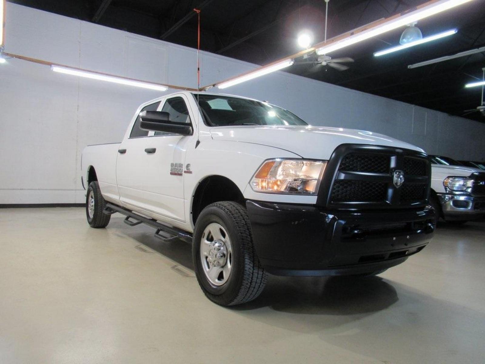 2017 Bright White Clearcoat /Black Ram 2500 Tradesman (3C6UR5HL4HG) with an Cummins 6.7L I6 Turbodiesel engine, Automatic transmission, located at 15300 Midway Rd., Addison, 75001, (972) 702-0011, 32.958321, -96.838074 - Photo #1
