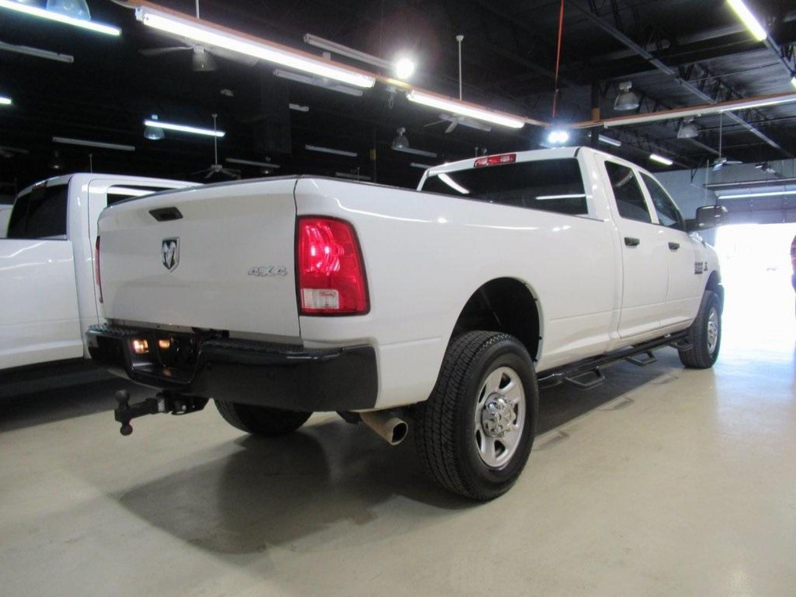 2017 Bright White Clearcoat /Black Ram 2500 Tradesman (3C6UR5HL4HG) with an Cummins 6.7L I6 Turbodiesel engine, Automatic transmission, located at 15300 Midway Rd., Addison, 75001, (972) 702-0011, 32.958321, -96.838074 - Photo #2