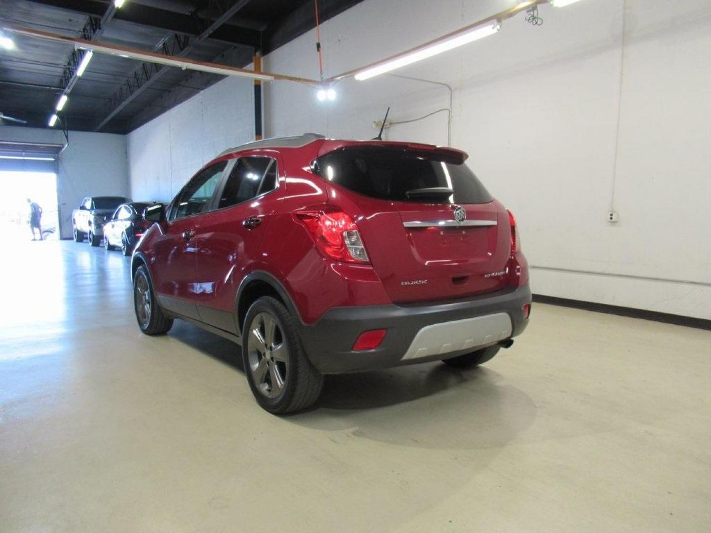 2014 Ruby Red Metallic /Ebony Buick Encore Leather (KL4CJCSBXEB) with an ECOTEC 1.4L I4 SMPI DOHC Turbocharged VVT engine, Automatic transmission, located at 15300 Midway Rd., Addison, TX, 75001, (972) 702-0011, 32.958321, -96.838074 - HOME OF THE NO HAGGLE PRICE - WHOLESALE PRICES TO THE PUBLIC!! Bluetooth, Hands Free Connectivity, Navigation, Backup Camera, Leather Seats, Sunroof / Moonroof, Encore Leather, 4D Sport Utility, ECOTEC 1.4L I4 SMPI DOHC Turbocharged VVT, 6-Speed Automatic, FWD, Ruby Red Metallic, Ebony Leather.<br>< - Photo#3