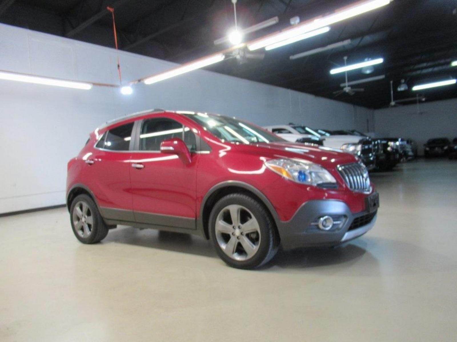 2014 Ruby Red Metallic /Ebony Buick Encore Leather (KL4CJCSBXEB) with an ECOTEC 1.4L I4 SMPI DOHC Turbocharged VVT engine, Automatic transmission, located at 15300 Midway Rd., Addison, 75001, (972) 702-0011, 32.958321, -96.838074 - HOME OF THE NO HAGGLE PRICE - WHOLESALE PRICES TO THE PUBLIC!! Bluetooth, Hands Free Connectivity, Navigation, Backup Camera, Leather Seats, Sunroof / Moonroof, Encore Leather, 4D Sport Utility, ECOTEC 1.4L I4 SMPI DOHC Turbocharged VVT, 6-Speed Automatic, FWD, Ruby Red Metallic, Ebony Leather.<br>< - Photo #6
