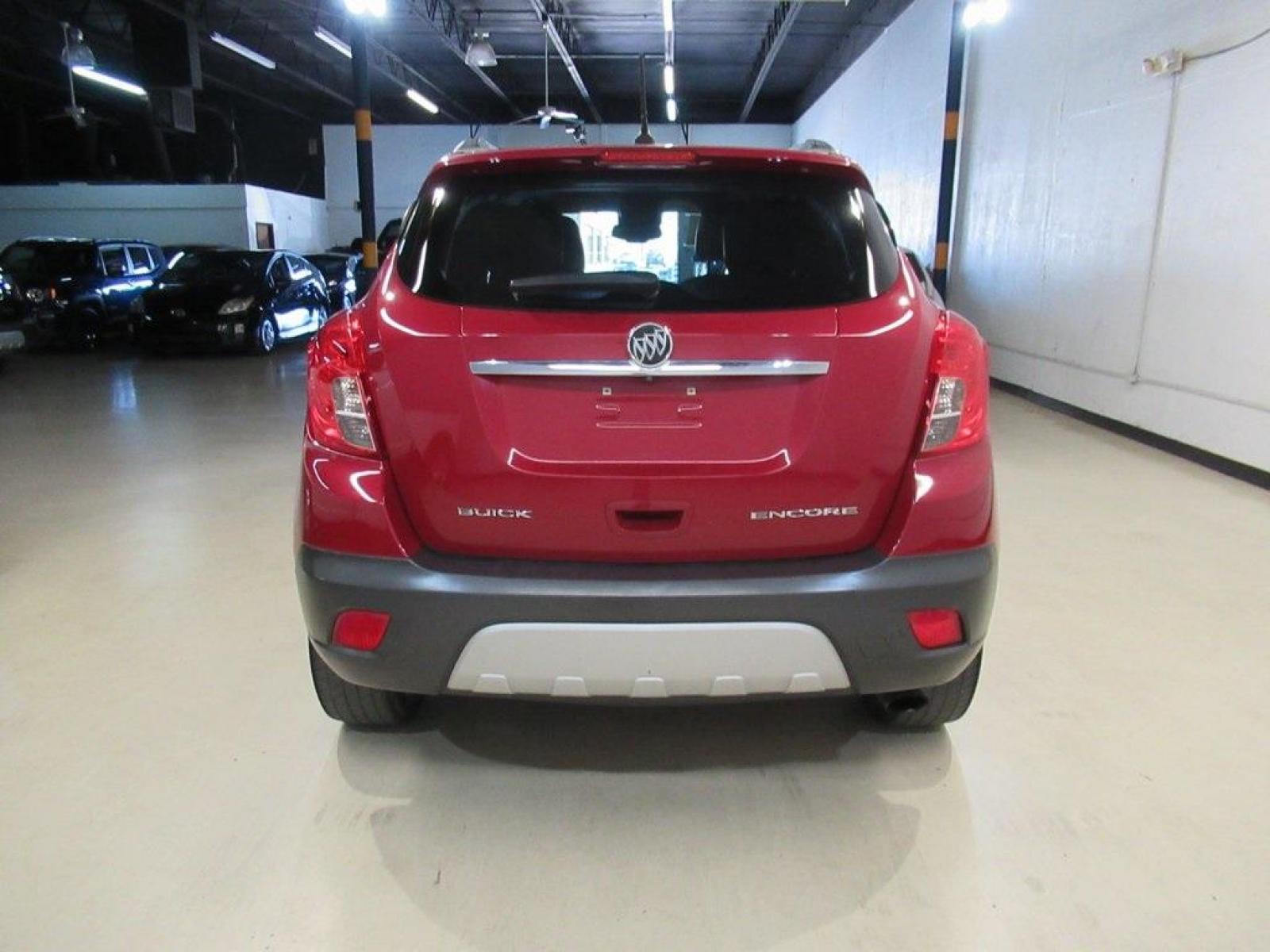 2014 Ruby Red Metallic /Ebony Buick Encore Leather (KL4CJCSBXEB) with an ECOTEC 1.4L I4 SMPI DOHC Turbocharged VVT engine, Automatic transmission, located at 15300 Midway Rd., Addison, TX, 75001, (972) 702-0011, 32.958321, -96.838074 - Photo #7