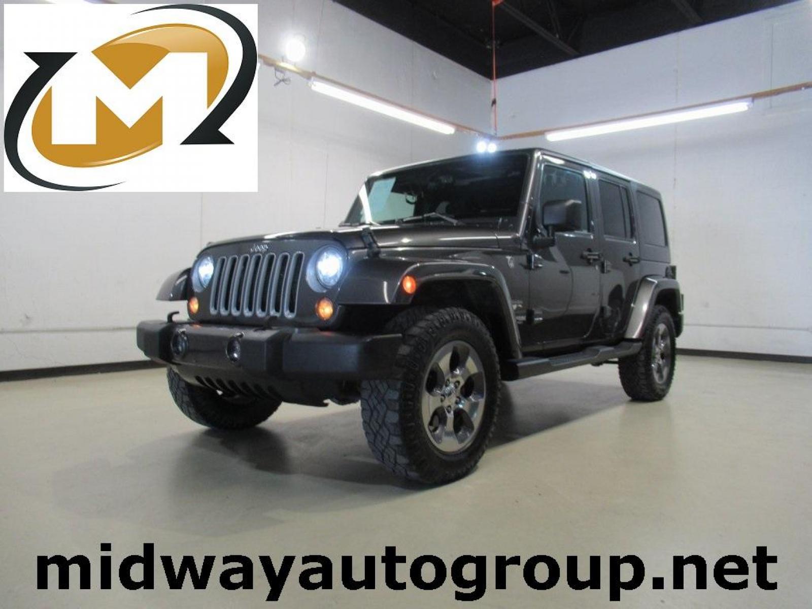 2018 Granite Crystal Metallic Clearcoat /Black Jeep Wrangler JK Unlimited Sahara (1C4BJWEG0JL) with an 3.6L V6 24V VVT engine, Automatic transmission, located at 15300 Midway Rd., Addison, TX, 75001, (972) 702-0011, 32.958321, -96.838074 - Photo #0