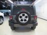 2018 Granite Crystal Metallic Clearcoat /Black Jeep Wrangler JK Unlimited Sahara (1C4BJWEG0JL) with an 3.6L V6 24V VVT engine, Automatic transmission, located at 15300 Midway Rd., Addison, TX, 75001, (972) 702-0011, 32.958321, -96.838074 - HOME OF THE NO HAGGLE PRICE - WHOLESALE PRICES TO THE PUBLIC!! Wrangler JK Unlimited Sahara, 4D Sport Utility, 3.6L V6 24V VVT, 5-Speed Automatic, 4WD, Granite Crystal Metallic Clearcoat, Black Cloth.<br><br>Granite Crystal Metallic Clearcoat 2018 Jeep Wrangler JK Unlimited Sahara<br><br>Recent Arri - Photo#6