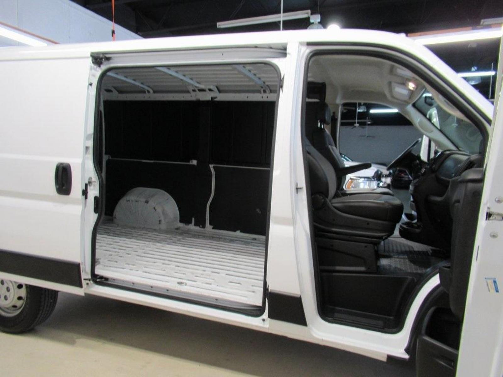 2020 Bright White Clearcoat /Black Ram ProMaster 1500 Low Roof (3C6TRVAGXLE) with an 3.6L V6 24V VVT engine, Automatic transmission, located at 15300 Midway Rd., Addison, 75001, (972) 702-0011, 32.958321, -96.838074 - HOME OF THE NO HAGGLE PRICE - WHOLESALE PRICES TO THE PUBLIC!! Backup Camera, ProMaster 1500 Low Roof, 3D Cargo Van, 3.6L V6 24V VVT, 6-Speed Automatic, FWD, Bright White Clearcoat, Black Vinyl.<br><br>Bright White Clearcoat 2020 Ram ProMaster 1500 Low Roof<br><br>Recent Arrival!<br><br><br>At Midwa - Photo #14