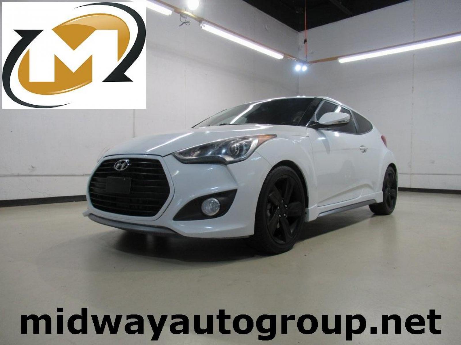 2014 Elite White Pearl /Black Hyundai Veloster Base (KMHTC6AE8EU) with an 1.6L I4 engine, Automatic transmission, located at 15300 Midway Rd., Addison, 75001, (972) 702-0011, 32.958321, -96.838074 - HOME OF THE NO HAGGLE PRICE - WHOLESALE PRICES TO THE PUBLIC!! 3D Hatchback, 1.6L I4, 6-Speed, FWD, White. Odometer is 2034 miles below market average!<br><br>White 2014 Hyundai Veloster<br><br>Recent Arrival!<br><br>Awards:<br> * 2014 KBB.com 10 Coolest New Cars Under $18,000<br><br>At Midway Auto - Photo #0