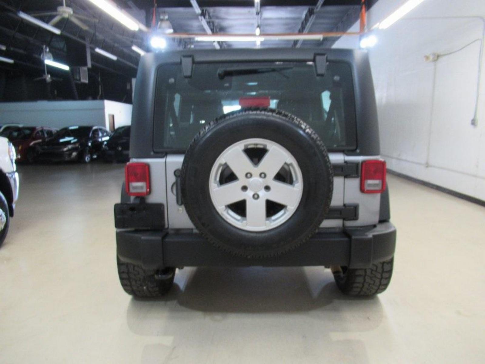 2018 Billet Silver Metallic Clearcoat /Black Jeep Wrangler JK Unlimited Sport (1C4BJWDG6JL) with an 3.6L V6 24V VVT engine, Automatic transmission, located at 15300 Midway Rd., Addison, TX, 75001, (972) 702-0011, 32.958321, -96.838074 - Photo #7