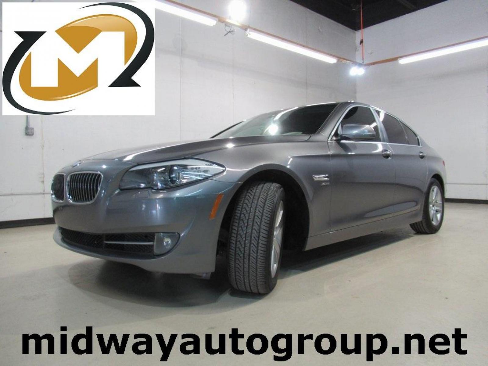 2012 Space Gray Metallic /Black BMW 5 Series 528i xDrive (WBAXH5C59CD) with an 2.0L I4 engine, Automatic transmission, located at 15300 Midway Rd., Addison, 75001, (972) 702-0011, 32.958321, -96.838074 - HOME OF THE NO HAGGLE PRICE - WHOLESALE PRICES TO THE PUBLIC!! 528i xDrive, 4D Sedan, 2.0L I4, 8-Speed Automatic, AWD, Space Gray Metallic, Black Leather.<br><br>Space Gray Metallic 2012 BMW 5 Series 528i xDrive<br><br>22/32 City/Highway MPG<br><br>Awards:<br> * Ward's 10 Best Engines * 2012 KBB. - Photo #0