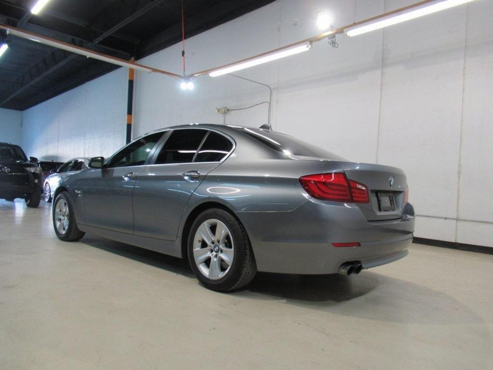 2012 Space Gray Metallic /Black BMW 5 Series 528i xDrive (WBAXH5C59CD) with an 2.0L I4 engine, Automatic transmission, located at 15300 Midway Rd., Addison, 75001, (972) 702-0011, 32.958321, -96.838074 - HOME OF THE NO HAGGLE PRICE - WHOLESALE PRICES TO THE PUBLIC!! 528i xDrive, 4D Sedan, 2.0L I4, 8-Speed Automatic, AWD, Space Gray Metallic, Black Leather.<br><br>Space Gray Metallic 2012 BMW 5 Series 528i xDrive<br><br>22/32 City/Highway MPG<br><br>Awards:<br> * Ward's 10 Best Engines * 2012 KBB. - Photo #2