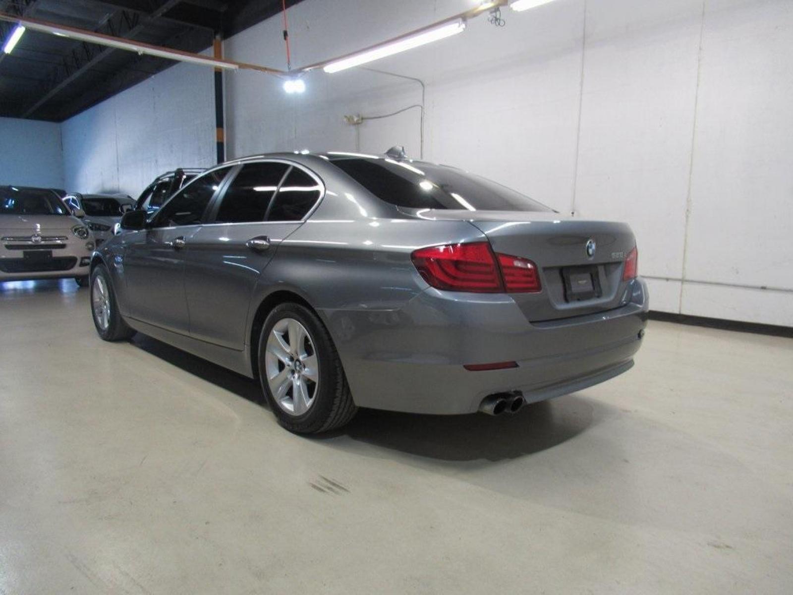 2012 Space Gray Metallic /Black BMW 5 Series 528i xDrive (WBAXH5C59CD) with an 2.0L I4 engine, Automatic transmission, located at 15300 Midway Rd., Addison, 75001, (972) 702-0011, 32.958321, -96.838074 - HOME OF THE NO HAGGLE PRICE - WHOLESALE PRICES TO THE PUBLIC!! 528i xDrive, 4D Sedan, 2.0L I4, 8-Speed Automatic, AWD, Space Gray Metallic, Black Leather.<br><br>Space Gray Metallic 2012 BMW 5 Series 528i xDrive<br><br>22/32 City/Highway MPG<br><br>Awards:<br> * Ward's 10 Best Engines * 2012 KBB. - Photo #3