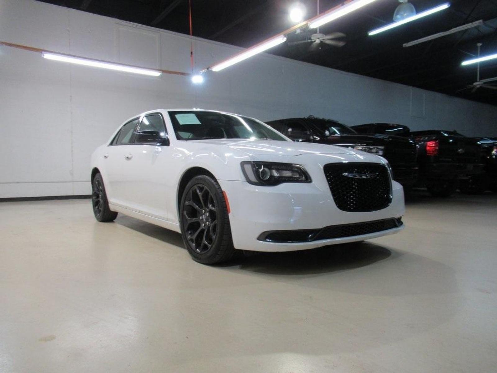 2019 Bright White Clearcoat /Black Chrysler 300 Touring (2C3CCAAG4KH) with an 3.6L V6 24V VVT engine, Automatic transmission, located at 15300 Midway Rd., Addison, 75001, (972) 702-0011, 32.958321, -96.838074 - Photo #1