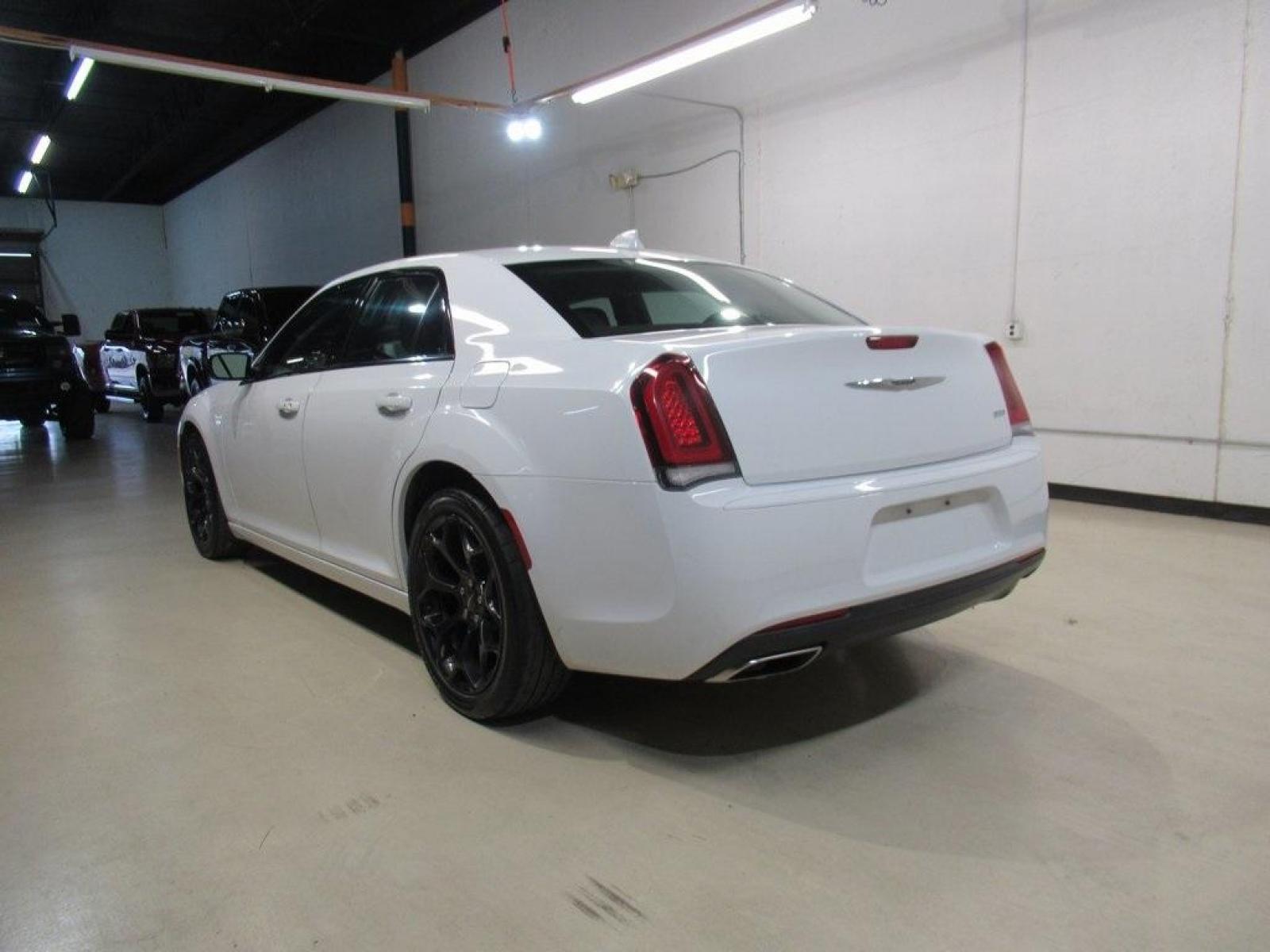 2019 Bright White Clearcoat /Black Chrysler 300 Touring (2C3CCAAG4KH) with an 3.6L V6 24V VVT engine, Automatic transmission, located at 15300 Midway Rd., Addison, 75001, (972) 702-0011, 32.958321, -96.838074 - Photo #3