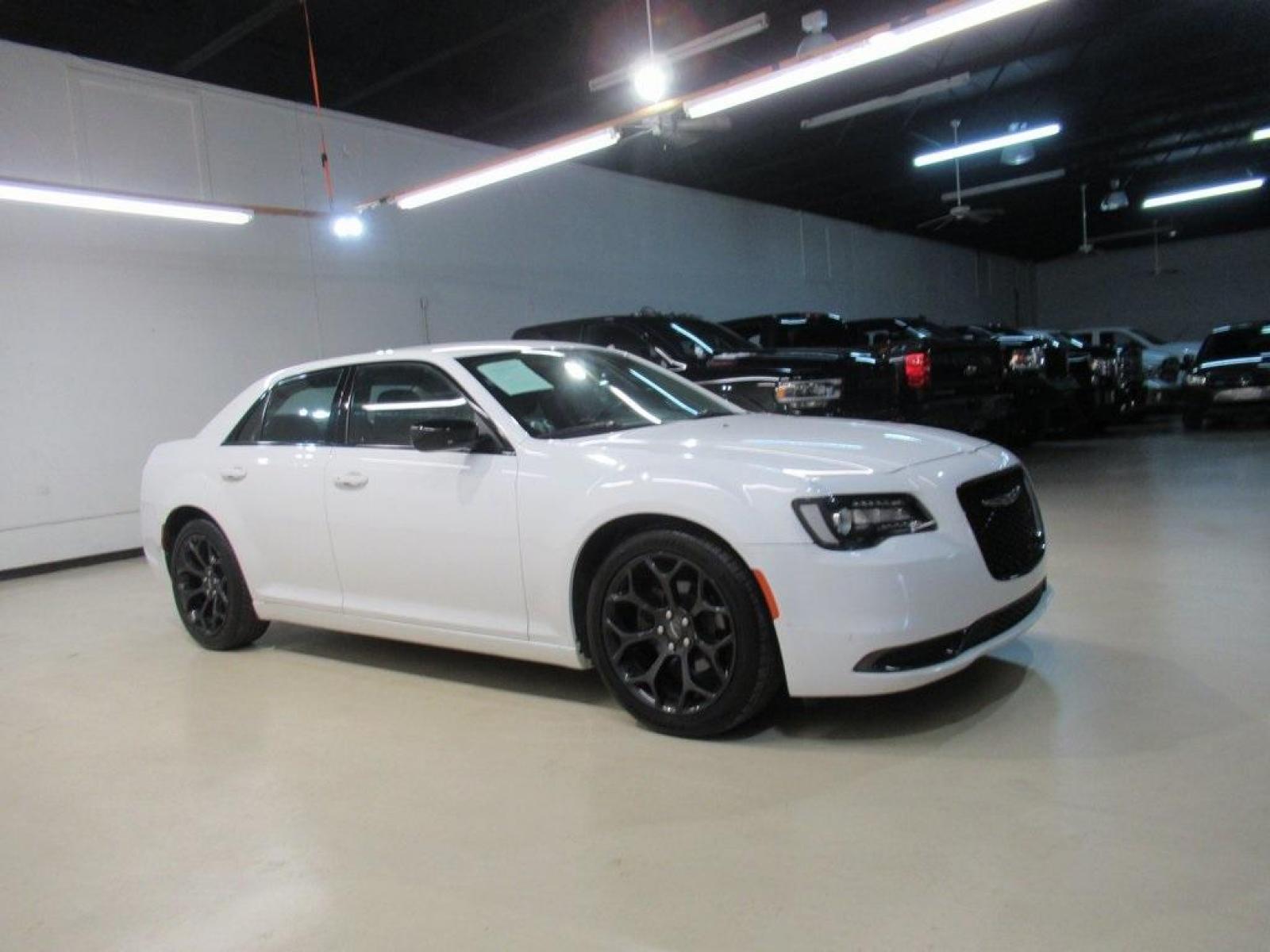 2019 Bright White Clearcoat /Black Chrysler 300 Touring (2C3CCAAG4KH) with an 3.6L V6 24V VVT engine, Automatic transmission, located at 15300 Midway Rd., Addison, 75001, (972) 702-0011, 32.958321, -96.838074 - Photo #6