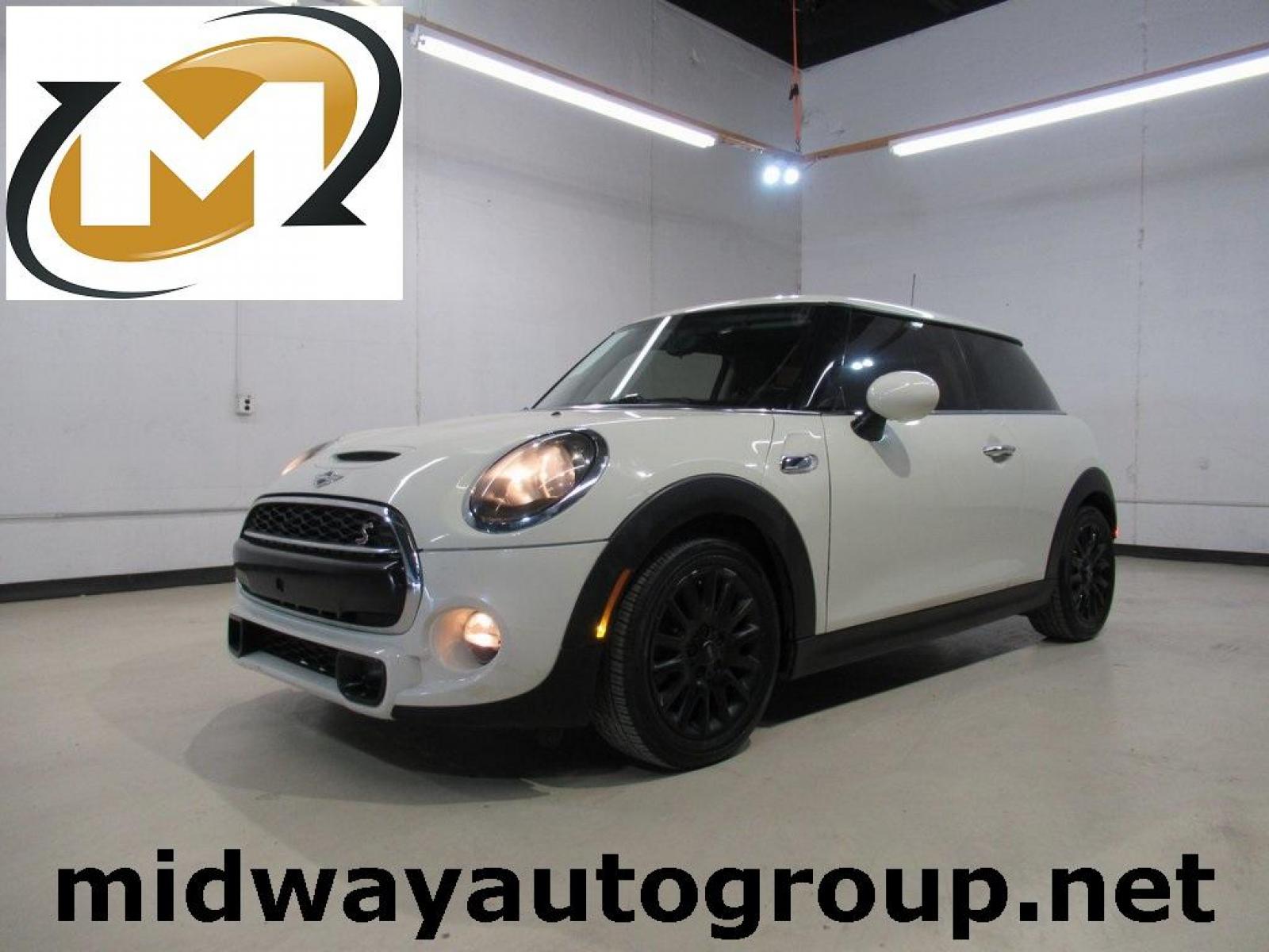 2014 Pepper White /Carbon Black MINI Cooper S Base (WMWXM7C51ET) with an 2.0L 16V TwinPower Turbo engine, Manual transmission, located at 15300 Midway Rd., Addison, 75001, (972) 702-0011, 32.958321, -96.838074 - Photo #0
