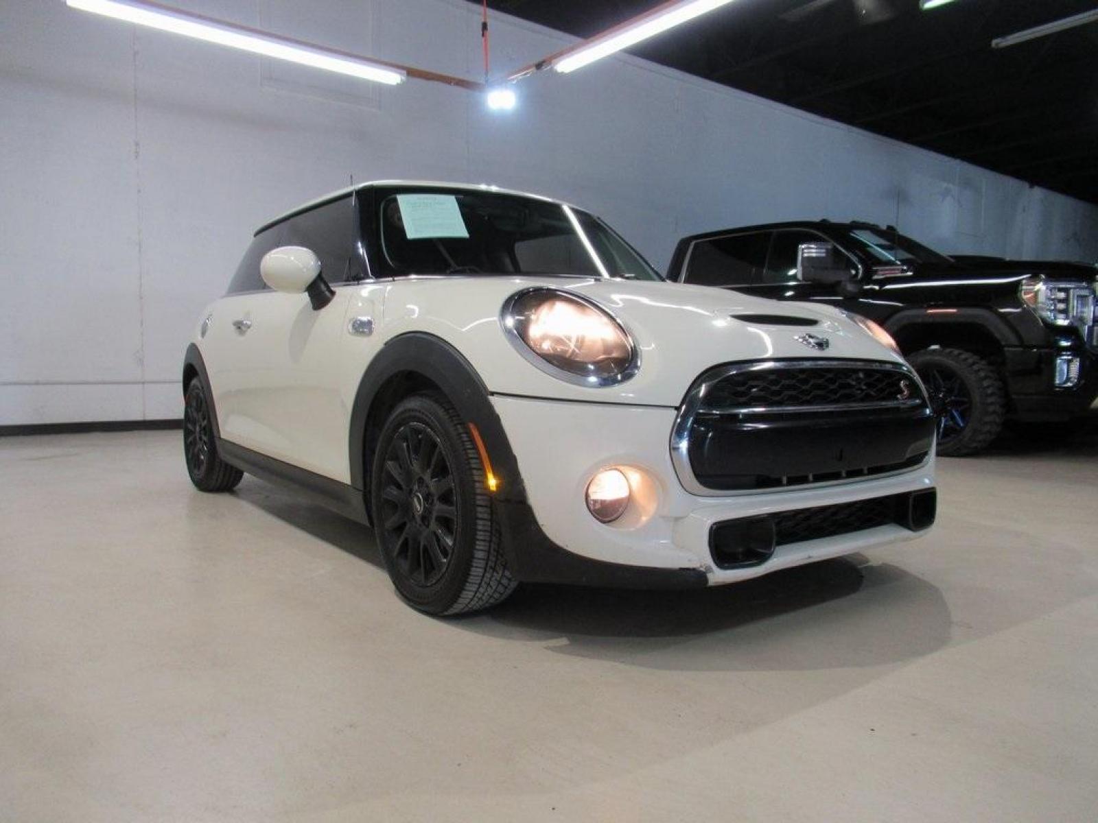2014 Pepper White /Carbon Black MINI Cooper S Base (WMWXM7C51ET) with an 2.0L 16V TwinPower Turbo engine, Manual transmission, located at 15300 Midway Rd., Addison, 75001, (972) 702-0011, 32.958321, -96.838074 - Photo #1